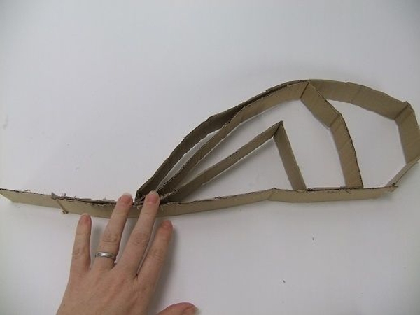 Bend and shape the strip into an interesting shape Bend and shape the strip into an interesting shape