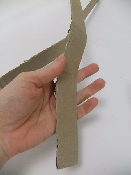 Cut a strip of cardboard Cut a strip of cardboard
