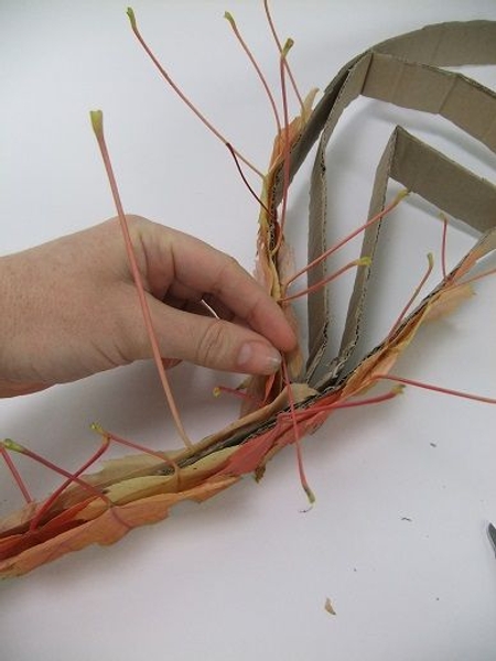 Glue the stems to point up. Glue the stems to point up.