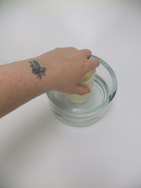 Press down hard and twist the candle Press down hard and twist the candle