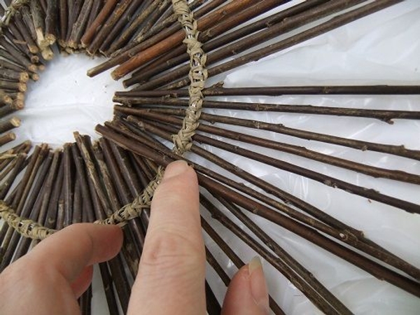 Glue the twigs over the bind wire Glue the twigs over the bind wire