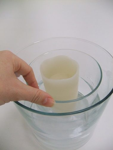 Place a candle in the dry inside vase Place a candle in the dry inside vase
