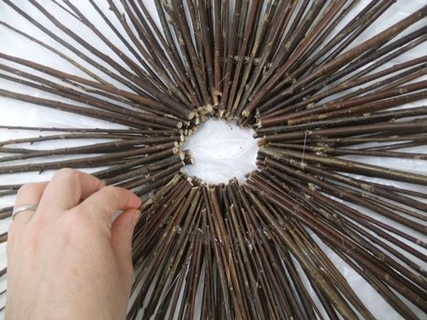 Slide in smaller twigs to fill any gaps Slide in smaller twigs to fill any gaps
