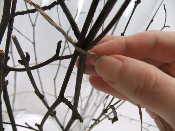 Work your way around and secure the last twig to the first Work your way around and secure the last twig to the first