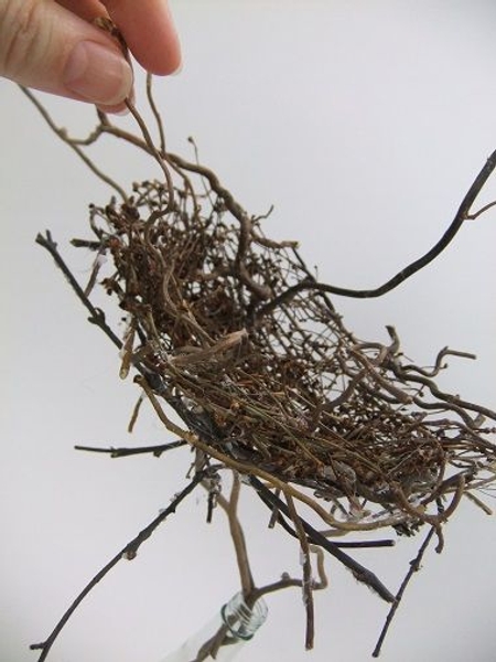 Glue in heavier twigs to adjust the tipping point Glue in heavier twigs to adjust the tipping point