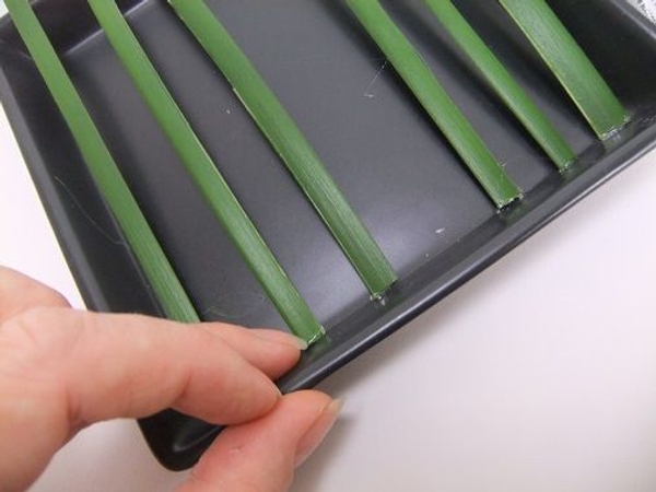 Continue to glue blades of grass leaving a gap to make it easier to work Continue to glue blades of grass leaving a gap to make it easier to work