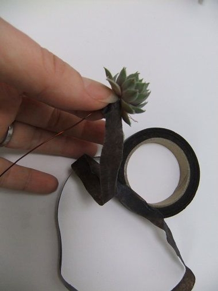 Cover the stem and wire with florist tape Cover the stem and wire with florist tape