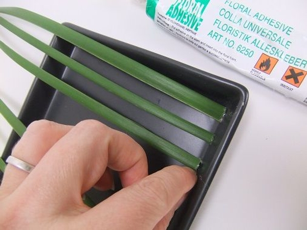 Make sure you glue the grass to the side and not the bottom Make sure you glue the grass to the side and not the bottom