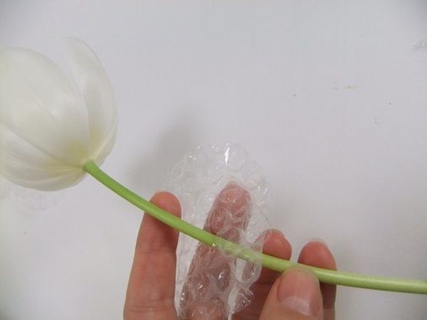 Simply slip the stem through the hole Simply slip the stem through the hole