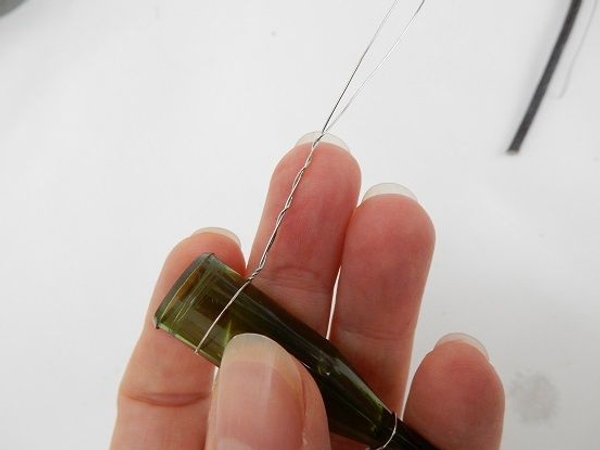 Twist the wire out to the side Twist the wire out to the side
