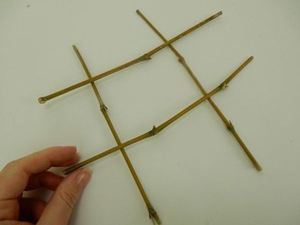 Cross 4 sections of bamboo. Cross 4 sections of bamboo.