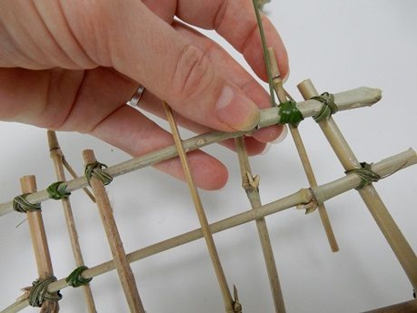 Place the hooks wide on the panel. Place the hooks wide on the panel.