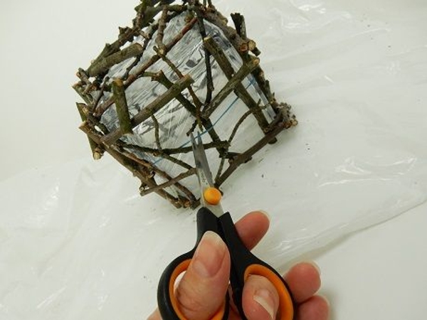Reach in and cut the elastic band Reach in and cut the elastic band