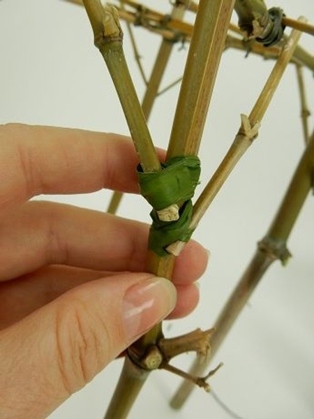Take extra care to latch the decorative side pieces with grass Take extra care to latch the decorative side pieces with grass