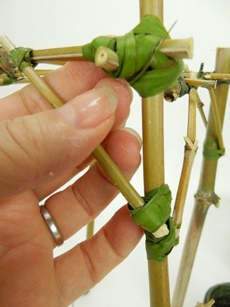 When you get to the end of the blade of grass knot it in on itself or glue it in place When you get to the end of the blade of grass knot it in on itself or glue it in place