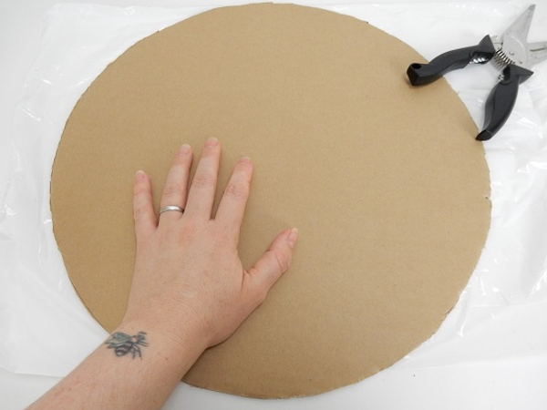 Cut a large cardboard circle.