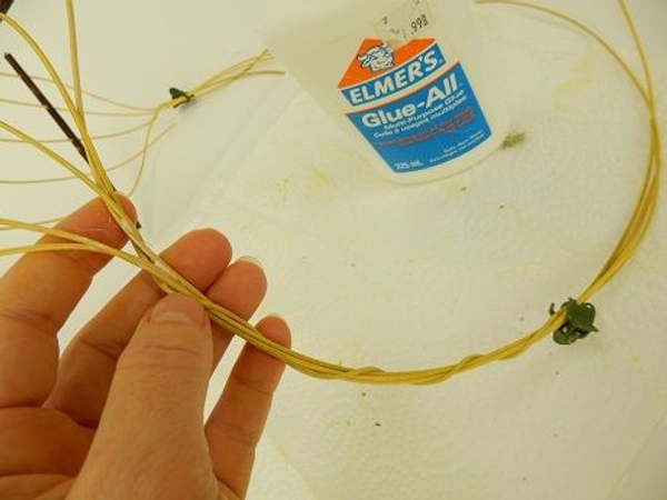 Place a tiny bit of wood glue on the twisted cane Place a tiny bit of wood glue on the twisted cane