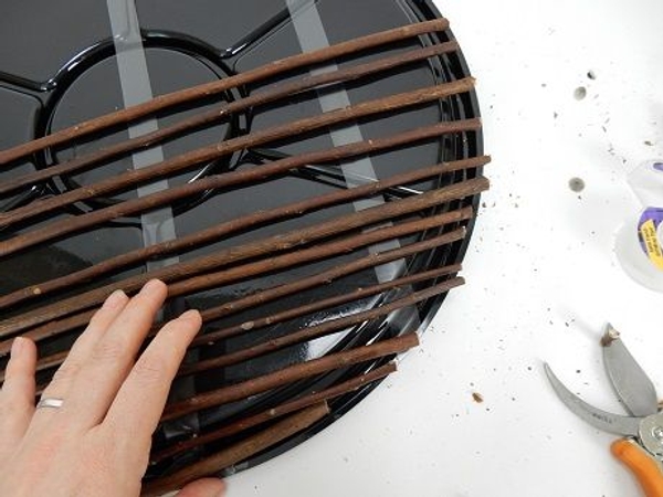 Press the twigs slightly down to stick to the tape Press the twigs slightly down to stick to the tape