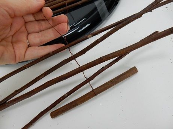 Work your way up adding twigs as you go Work your way up adding twigs as you go