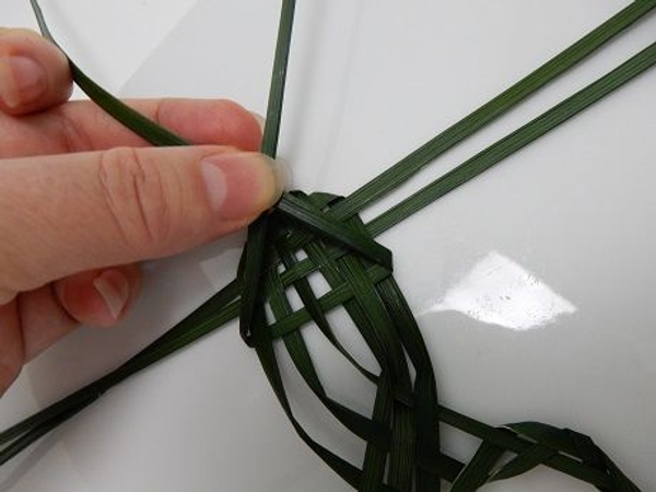 Bend the bottom two blades over and up Bend the bottom two blades over and up