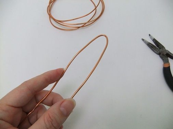 Bend the soft wire in half Bend the soft wire in half