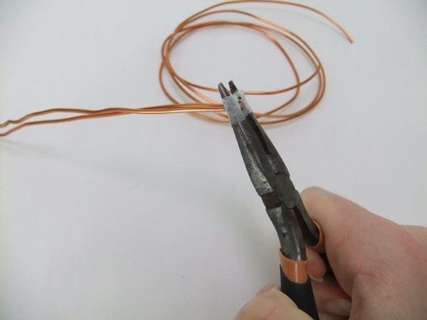 Close the loop with pliers Close the loop with pliers