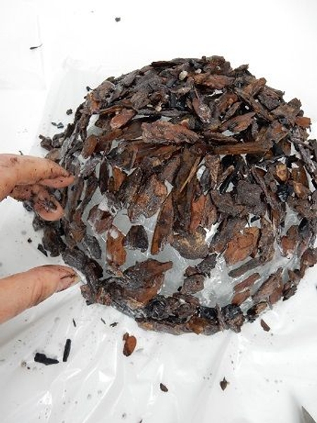 Keep adding the bark pieces like you would build up a puzzle Keep adding the bark pieces like you would build up a puzzle