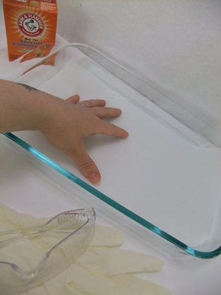Line a baking tray with baking paper Line a baking tray with baking paper