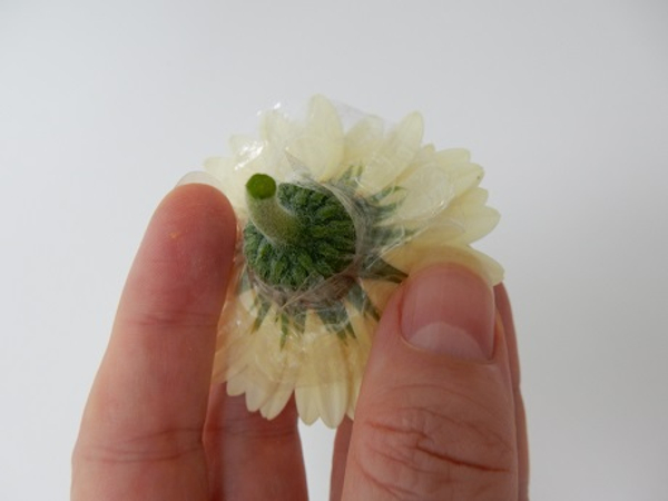 Press the stem all the way through so that the bubble skirt support the petals