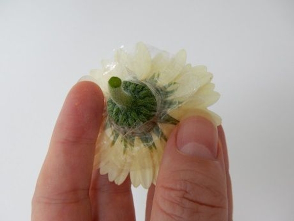 Press the stem all the way through so that the bubble skirt support the petals Press the stem all the way through so that the bubble skirt support the petals