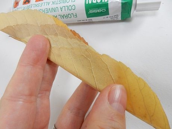 Add another leaf and secure with tiny drops of glue Add another leaf and secure with tiny drops of glue