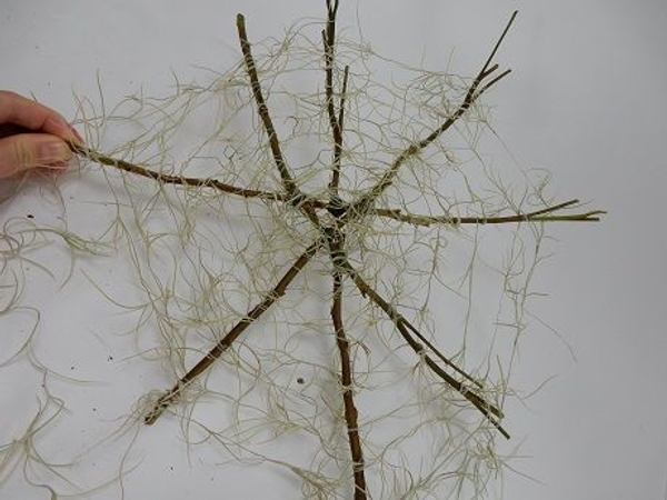Keep wrapping until you reach the end of all the twigs Keep wrapping until you reach the end of all the twigs