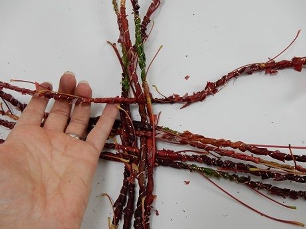 Start weaving in the long garland Start weaving in the long garland