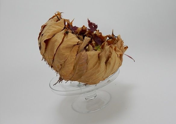 Acorn inspired autumn leaf armature.