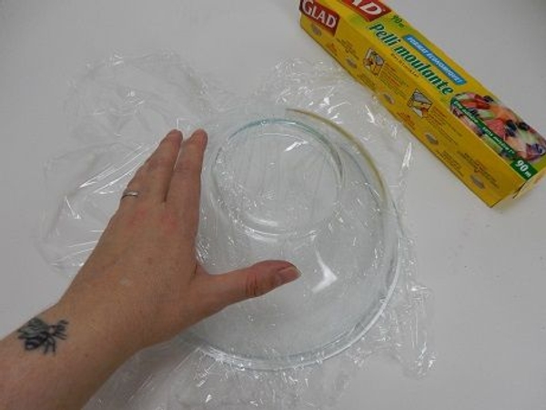 Cover a bowl with cling wrap Cover a bowl with cling wrap