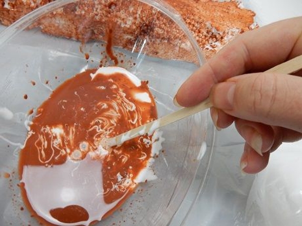 Mix to create a runny brown glue. Mix to create a runny brown glue.