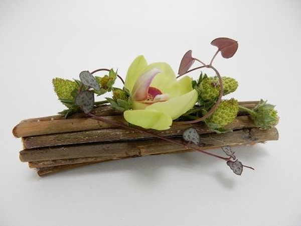 A twig corsage using a magnet A twig corsage using a magnet