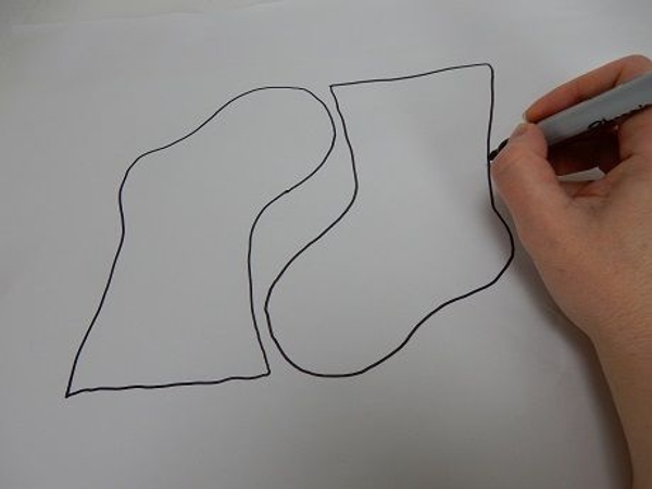 Draw a very basic Christmas stocking outline to use as a guiding template Draw a very basic Christmas stocking outline to use as a guiding template