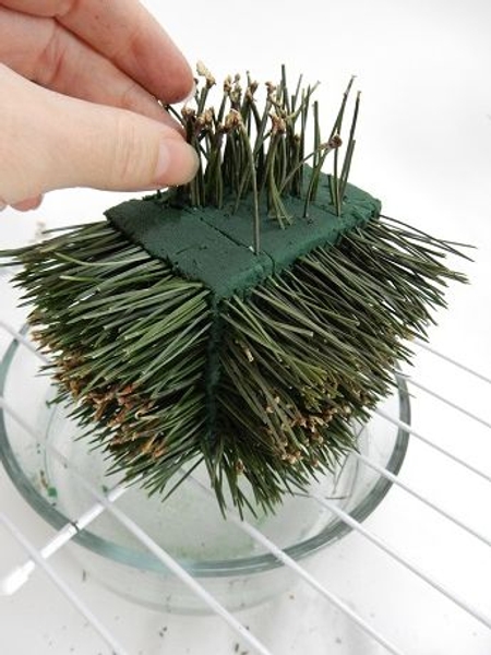 Move around the flat surfaces and press in needles Move around the flat surfaces and press in needles