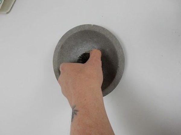 And while pressing down start to twist. And while pressing down start to twist.