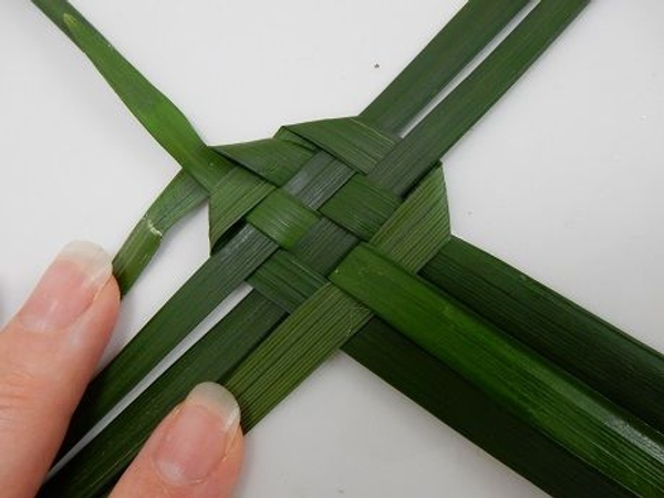 Fold the inside leaf on the left under the leaf Fold the inside leaf on the left under the leaf