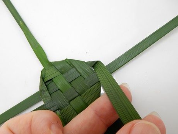 Fold the top leaf on the right under Fold the top leaf on the right under