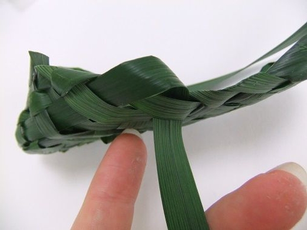 Slipping it into the weave Slipping it into the weave
