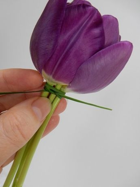 When I did this as a child I just latched the flowers together with a thin blade of grass When I did this as a child I just latched the flowers together with a thin blade of grass