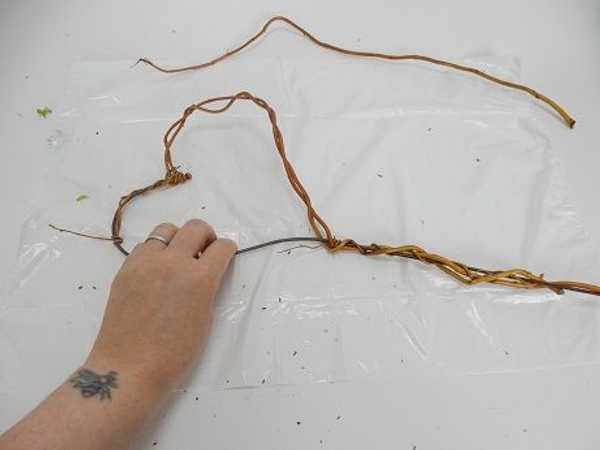 Adjust the tension in the twigs as you weave Adjust the tension in the twigs as you weave