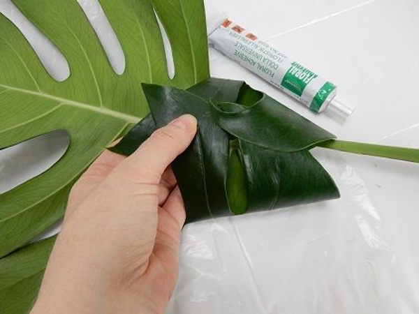Fold the next set of lobes over and secure Fold the next set of lobes over and secure