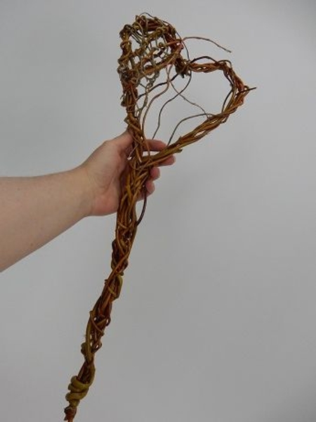 Weave in a few looser twigs to create movement Weave in a few looser twigs to create movement