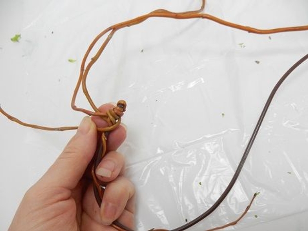 Weave in a second twig Weave in a second twig