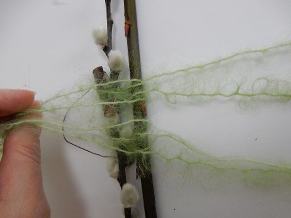 by folding the string open again over the willow by folding the string open again over the willow