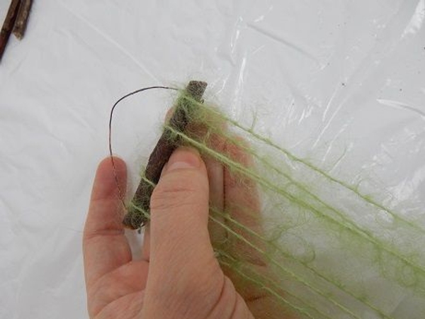 Do the same with the rest of the wool to have eight equil string pieces Do the same with the rest of the wool to have eight equil string pieces